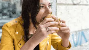 woman-eating-hamburger